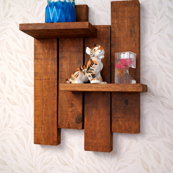 Antique pine staggered wooden wall shelf mounted on wall