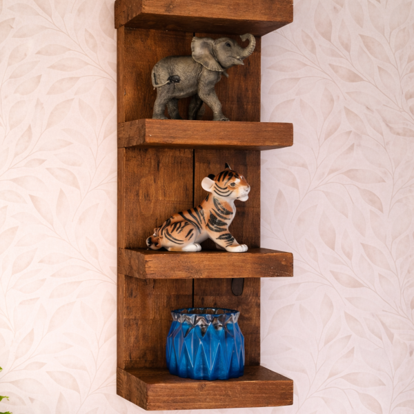 Antique pine reclaimed scaffold board chunky wall shelving unit styled with ornaments